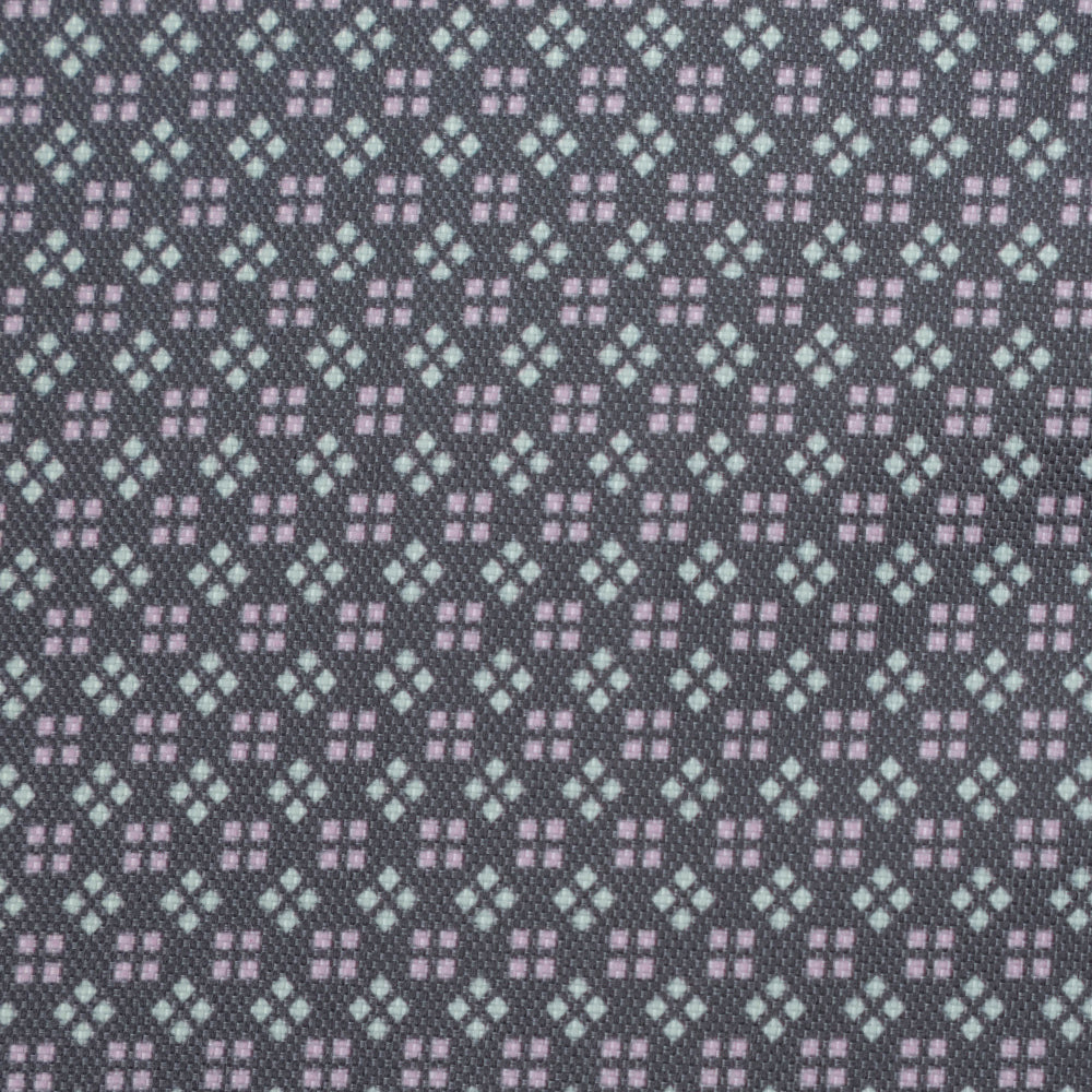 Close up colour swatch of the limited edition Heather Field pattern waterproof dog coat by Ginger Ted.